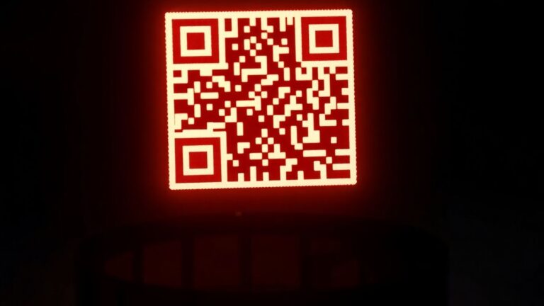Dynamic QR code on film reel