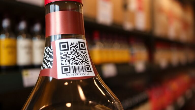 Liquor bottle with QR code for tracking.